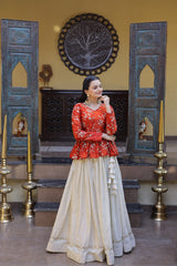 Pink Embroidered Peplum Top with Ivory Flared Lehenga Set